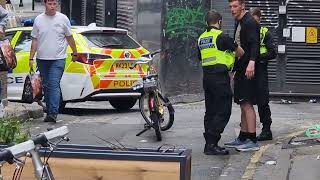 another guy gets searched  in the back streets of manchester