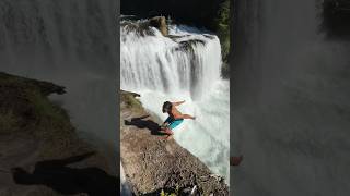 CRAZY TRIPLE FlIP INTO WATERFALL 😳                 #cliffjumping #shorts