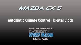 How to change the digital clock on automatic climate control equipped 2015 Mazda CX-5s