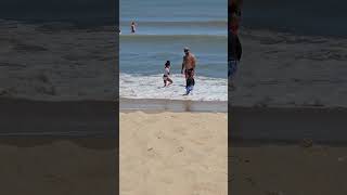 my son trying to out run the waves at the beach. #fun #kid