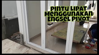 Pintu Lipat Menggunakan Engsel Pivot