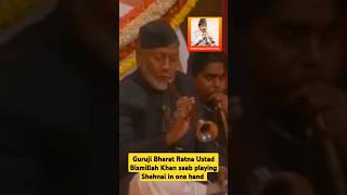 Guruji Bharat Ratna Ustad Bismillah Khan saab playing Shehnai in one hand