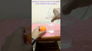 Glass water and ball trick | center of mass practical example | shifting of centre of mass | #shorts