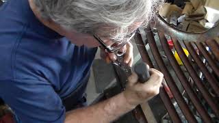 Working the dents out of the 42 chevy grill. pt4