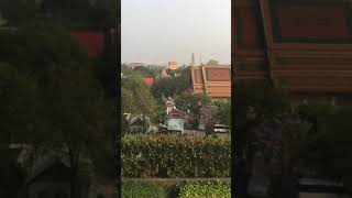 Temple outside with monks chanting Bangkok Thailand