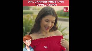 The girl is trying to change the price of the tag