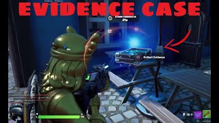 Retrieve an evidence case from misty meadows LOCATION - Fortnite  Guide