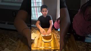 Making cinnamon bread with dada