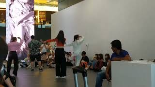 Singers and dancers in Rome Fiumicino Airport waiting hall