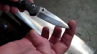 Forging a blade to fit a folding knife.