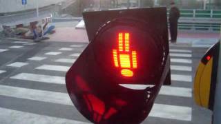 Red man hanged upside down on the street