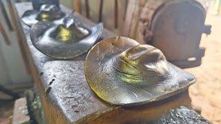 Forging a cowboy hat