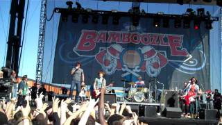 Jonathan from Forever the Sickest Kids climbing the Bamboozle Stage