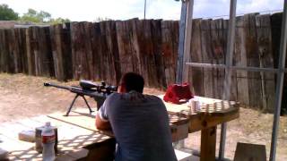 Barrett 50 cal sniper rifle....and sisters reaction to the first shot!