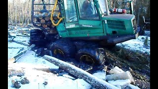 Logging in wet winter forest with Timberjack 810B