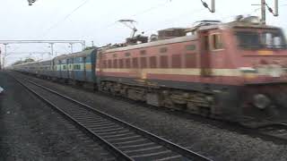 Late Running 18401 Puri Okha Dwarka Express Cruising Past Behind BZA WAP4