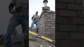 Showing how to  brick double corbel on a chimney cap masonry