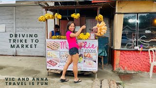 Life in the Philippines. Driving trike to market. Cooking in dirty kitchen.