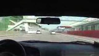 Honda S2000 passes two VW Golf R32 on the straight at Monza