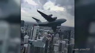 This plane passes very close to the building