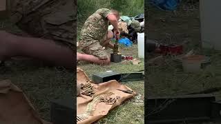 Ukrainian officer smashing potatoes woth granate