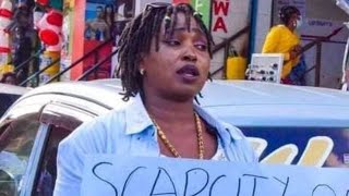 VIDEO of Eldoret woman LUCY CHEMUTAI Desperately Looking for a HUSBAND with a PLACARD on the STREETS