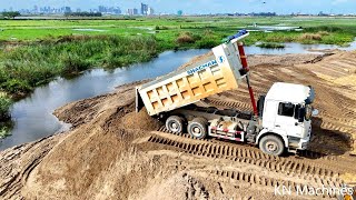 Continue Project, Bulldozer SHANTUI Pushing Sand And Truck 10weel Unloading Sand For Filling Lake