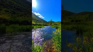 the most beautiful weather green mountains and water