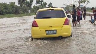 Banjir tak membuat pengemudi takut tengelam