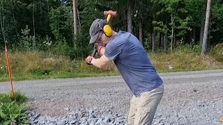 Splitting Firewood Using Wedge & Sledgehammer