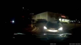 Dashcam: Woman tries to exit the "DO NOT ENTER" entrance only area. Forced to reverse out