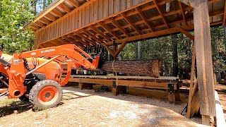 Big coke bottle pine log puts up a fight but makes nice lumber