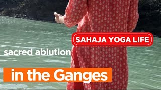 Sacred ablution in the waters of the Ganges. March 2024.