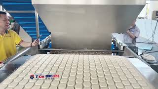 biscuit production machine, with customizable molds.