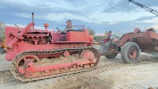 Running a HD 6 ￼￼￼ Allis Charmers￼ Bulldozer￼ with a Allis chalmers scraper￼.