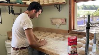 Vince shaping sourdough loaves for Brick oven bread shares