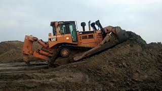 The bulldozer is removing the soil and making it look like a hill | Caterpillar Boy