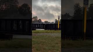 Very dangerous and very stupid. Kids walking across train bridge.