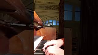 Improvising a morceau on 1883's organ