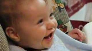 Laughing in the High Chair