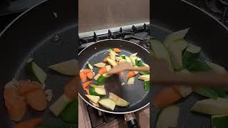 Stir fry beef and sausage with zucchini carrots tofu balls