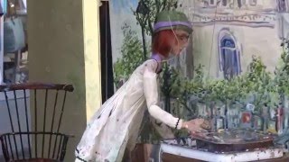 160408 FQF Mini Artist   on Royal Street Paints Rear of Cathedral