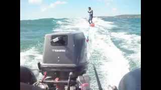 Tohatsu 25hp Outboard Bombard Commando C2 Towing a surfer in huge waves