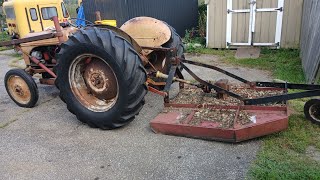 8N  ford tractor mowing with brush hog around the blueberry farm