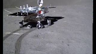 Video of the Yutu 2 rover making the first tracks on the far side of the Moon after deploy