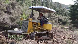 Remote Cabin built after clearing an area with a Komatsu D21A bulldozer - from start to finish.