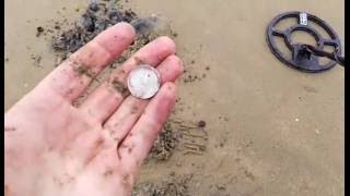 8/10/16 Metal detecting wet sand lots of old coins great day