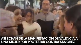 Así echan de la manifestación de Valencia a una mujer por protestar contra Sánchez