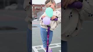 cute girl with scooter