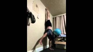 One Arm Handstand w Wall Support